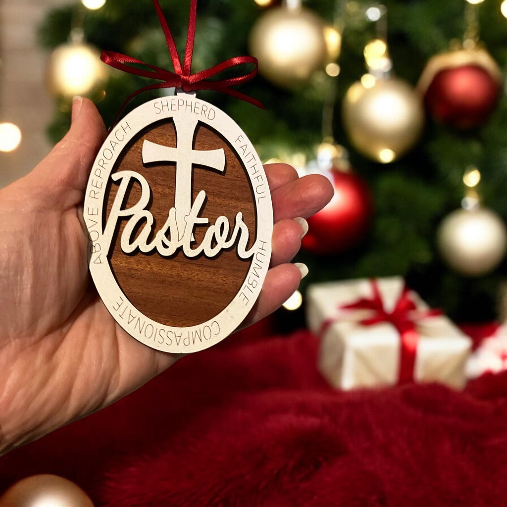 Wooden pastor Christmas ornament with cross and engraved traits”