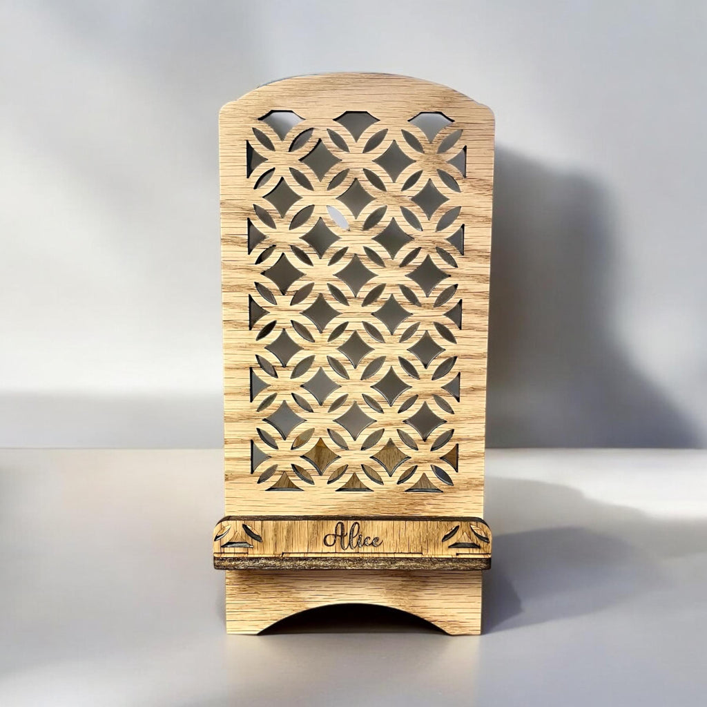Custom engraved phone dock with floral lattice pattern