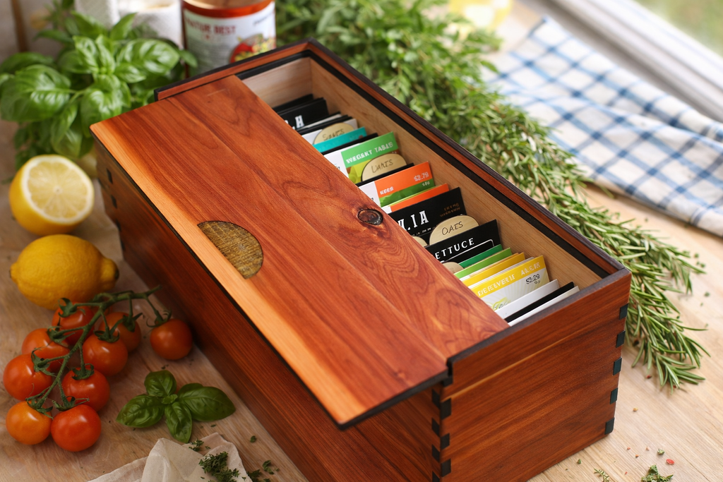 Personalized cedar seed storage box with dividers, designed for garden organization, by stitchesandwood.