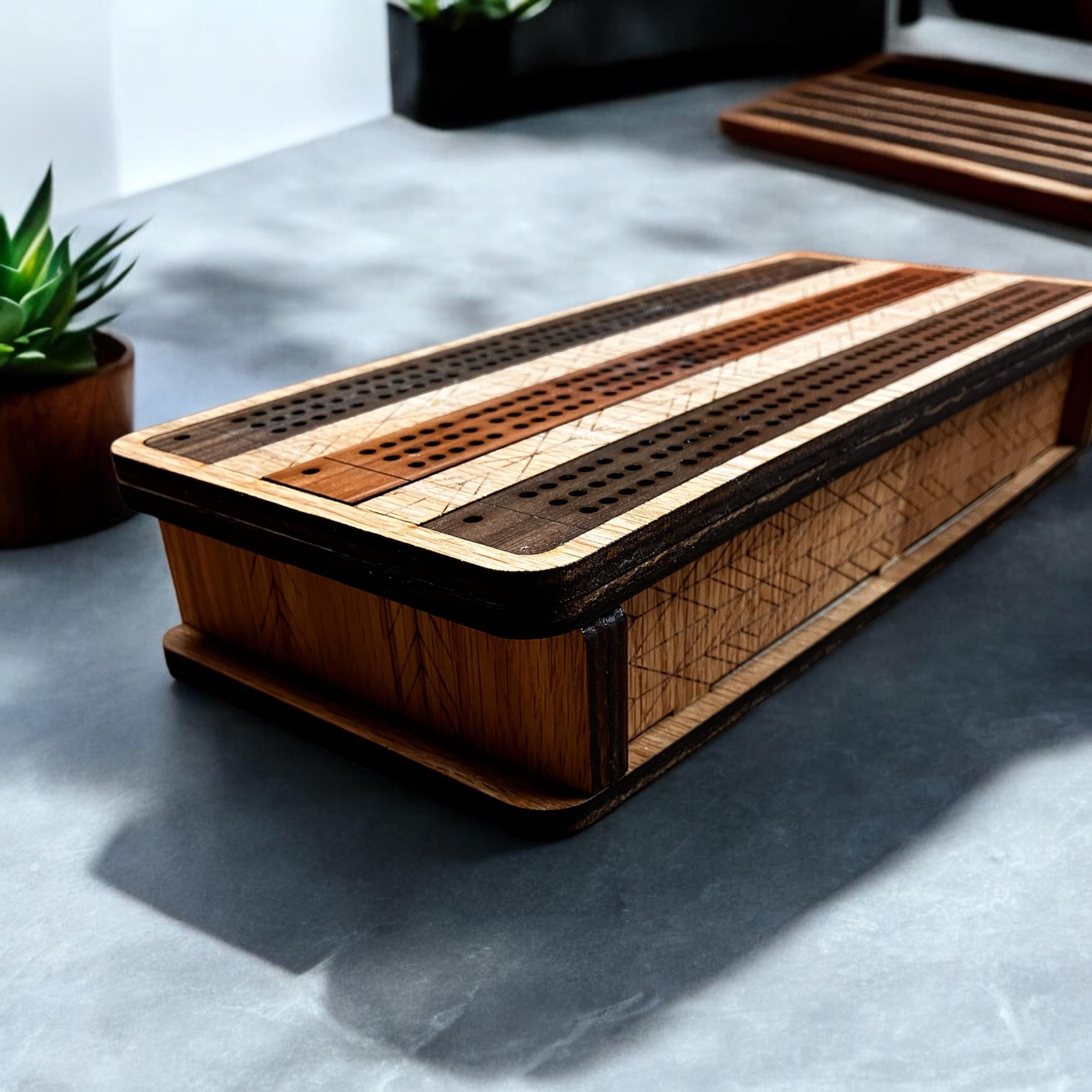 3-track cribbage board made of oak and walnut with inlaid wood finish