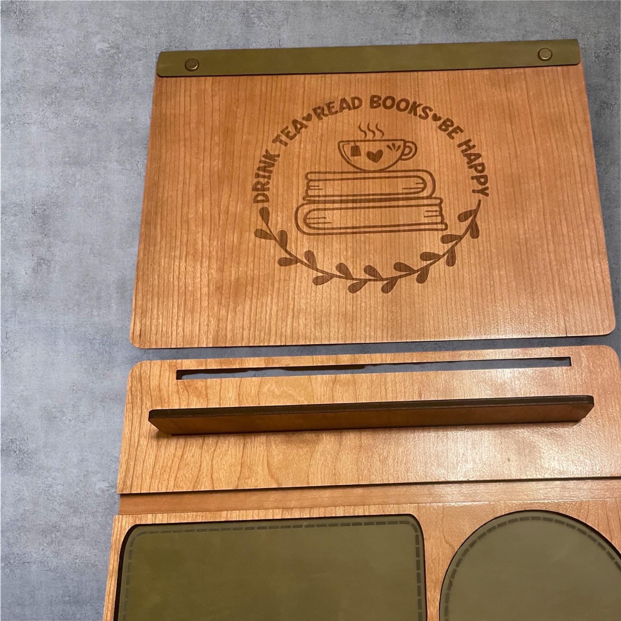 Unassembled cherry wood book valet with engraved ‘Drink Tea Read Books Be Happy’ design, shown flat for easy shipping and simple assembly.