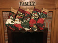 Personalized patchwork Christmas stockings hanging on a mantel