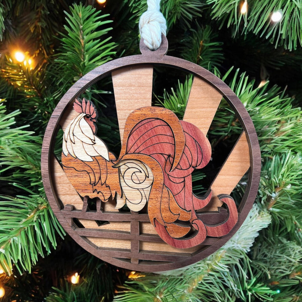 Wooden ornament with rooster design on a Christmas tree
