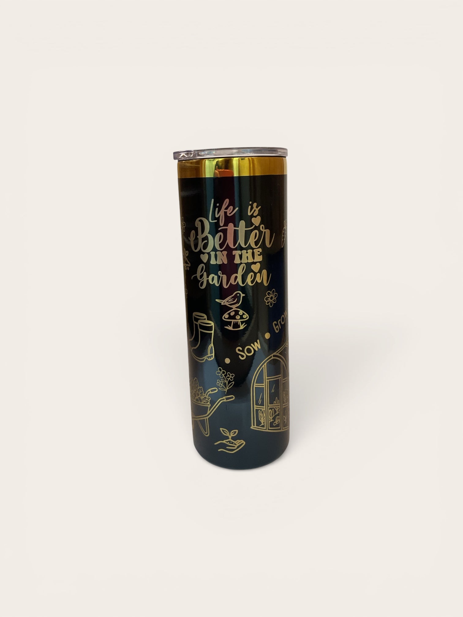 Tumbler with 'Life is Better in the Garden' text and gardening-themed design on a white background