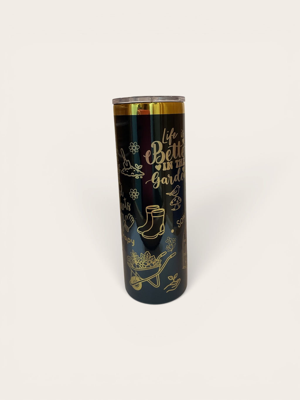 Tumbler with garden-themed design and text on a white background