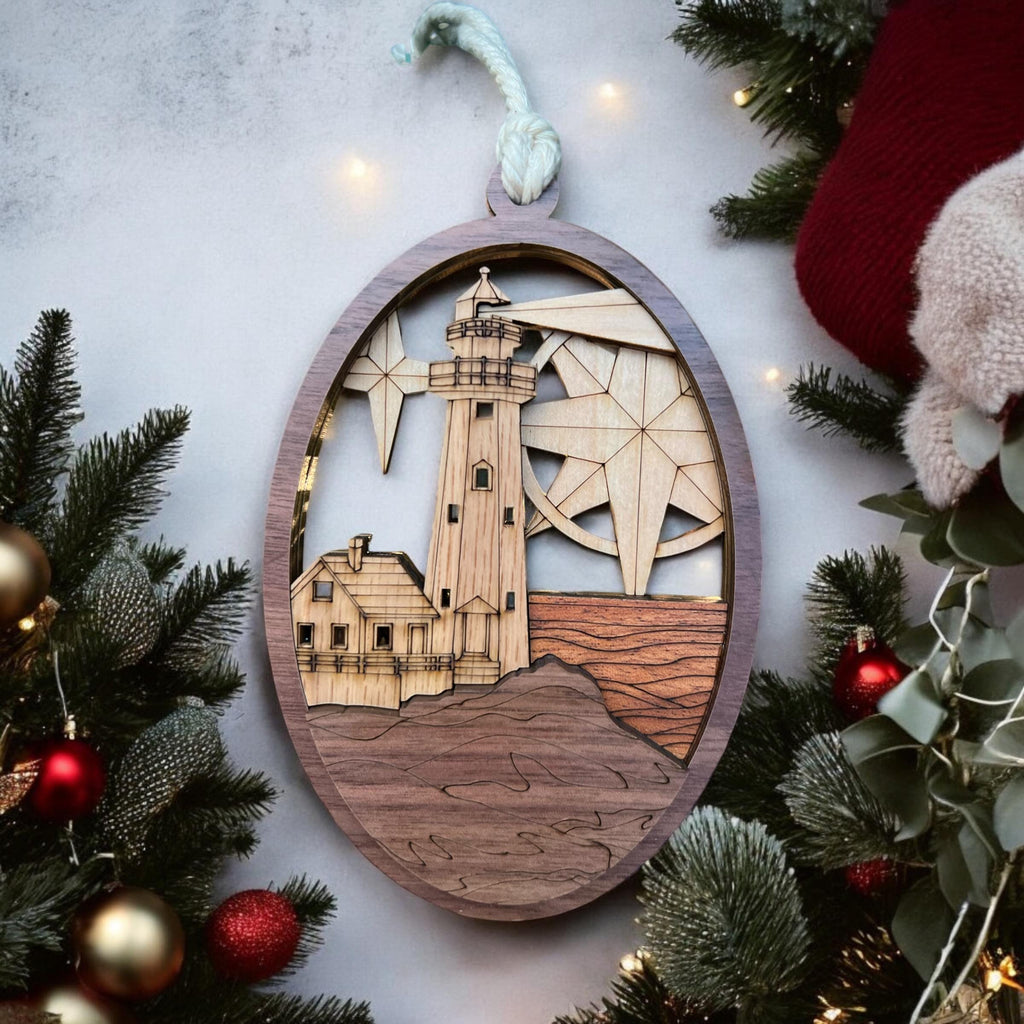 Close-up of engraved lighthouse and ocean detail