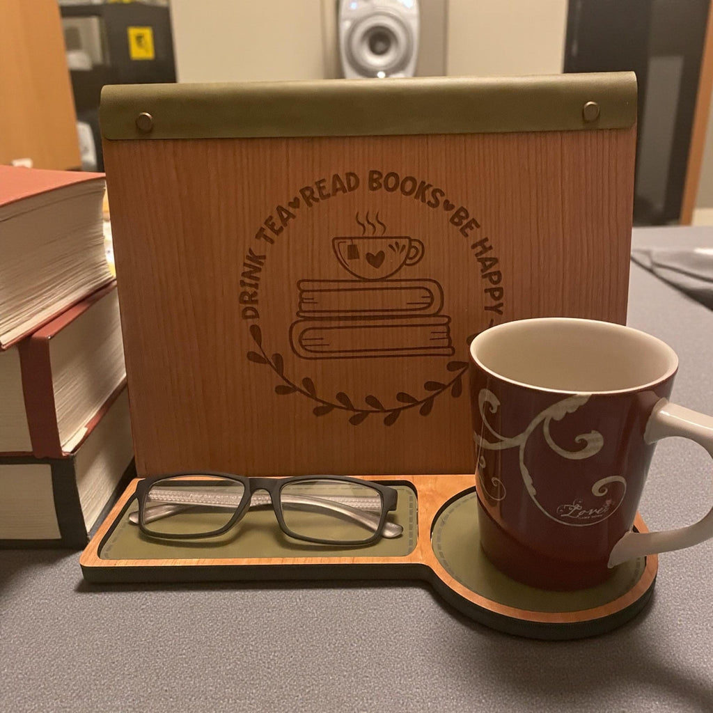 Close-up of engraved quote on cherry wood reading valet