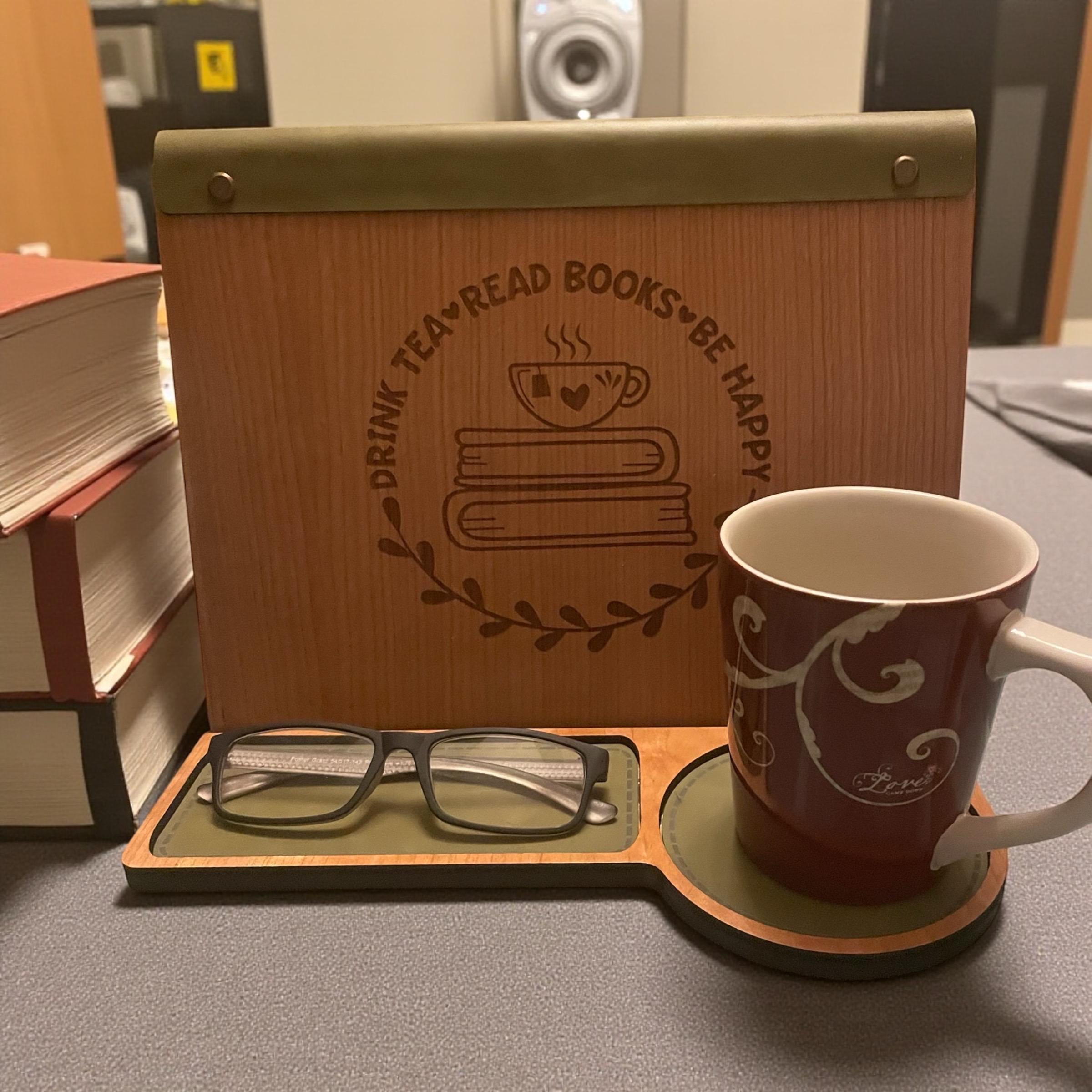 Close-up of engraved quote on cherry wood reading valet