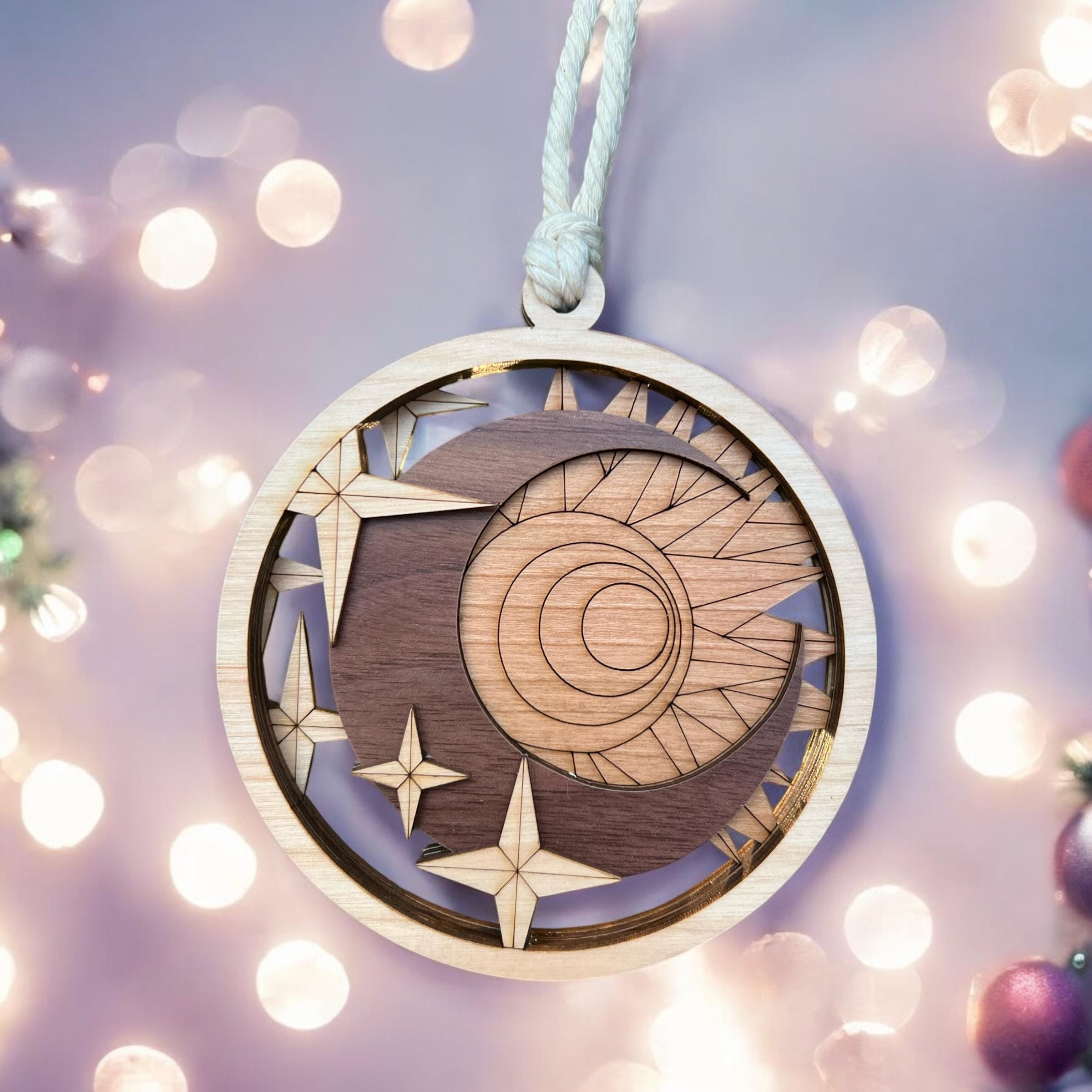 Wooden ornament with celestial design on a blurred light background