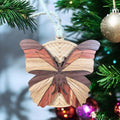 Handmade wooden butterfly ornament with layered wings