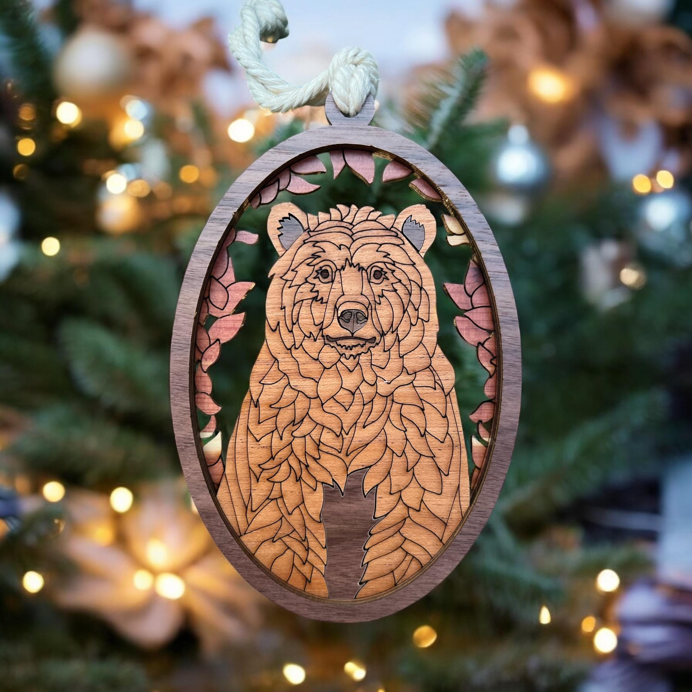 Handmade wooden bear ornament with woodland leaf frame