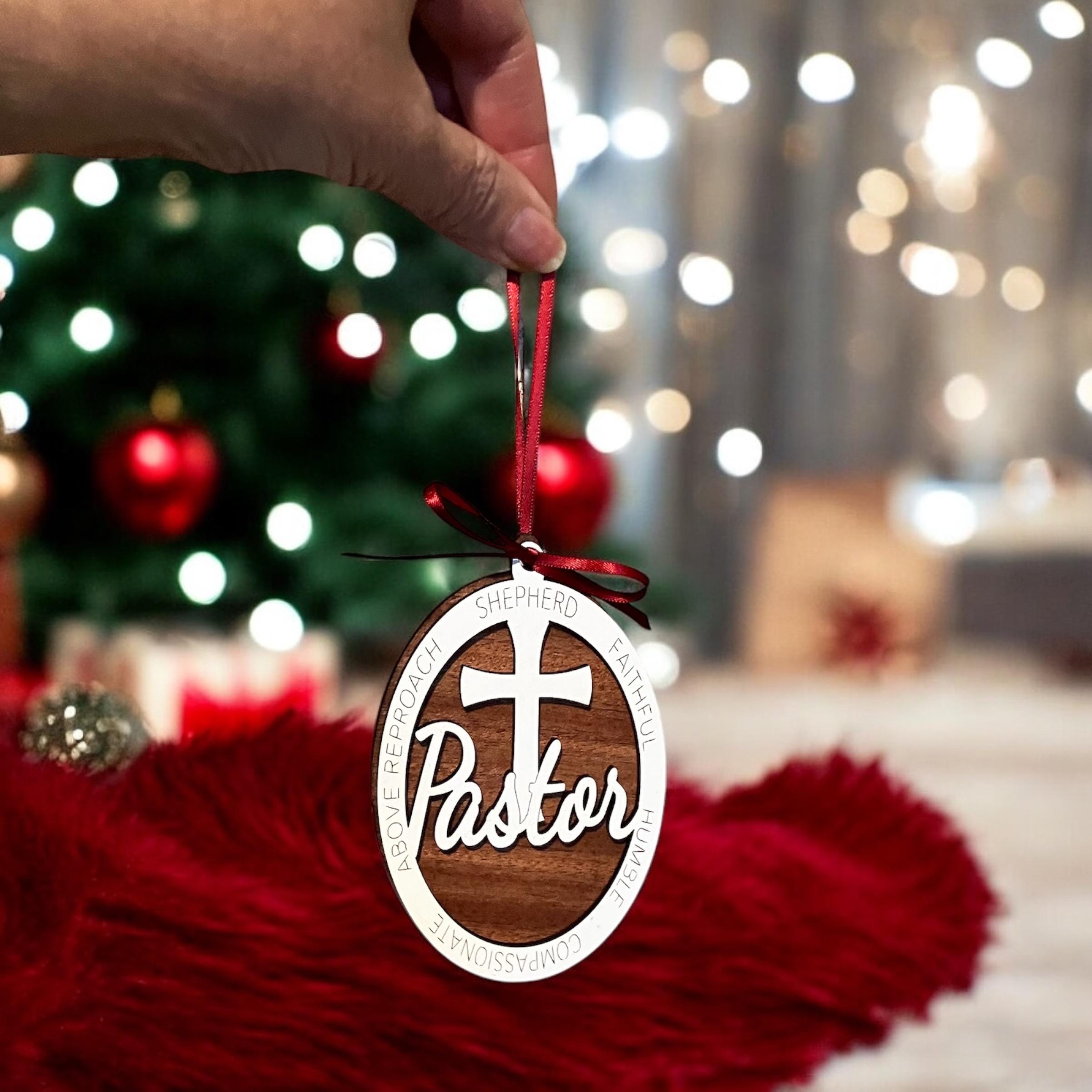 Layered wood pastor ornament with cross design and ribbon